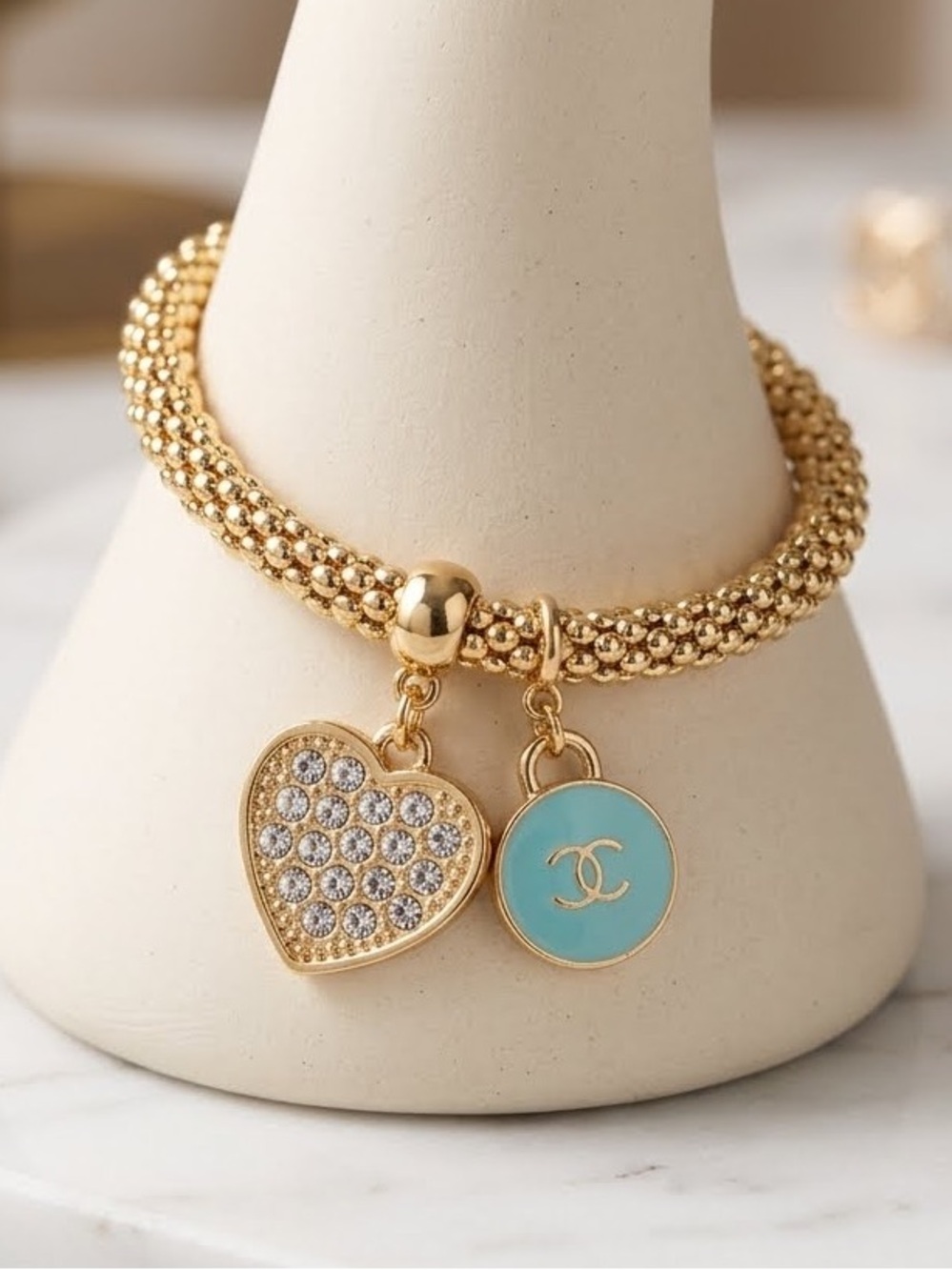 ChaneI Gold-Tone Charm Bracelet with Turquoise Enamel and Crystal Heart Charms